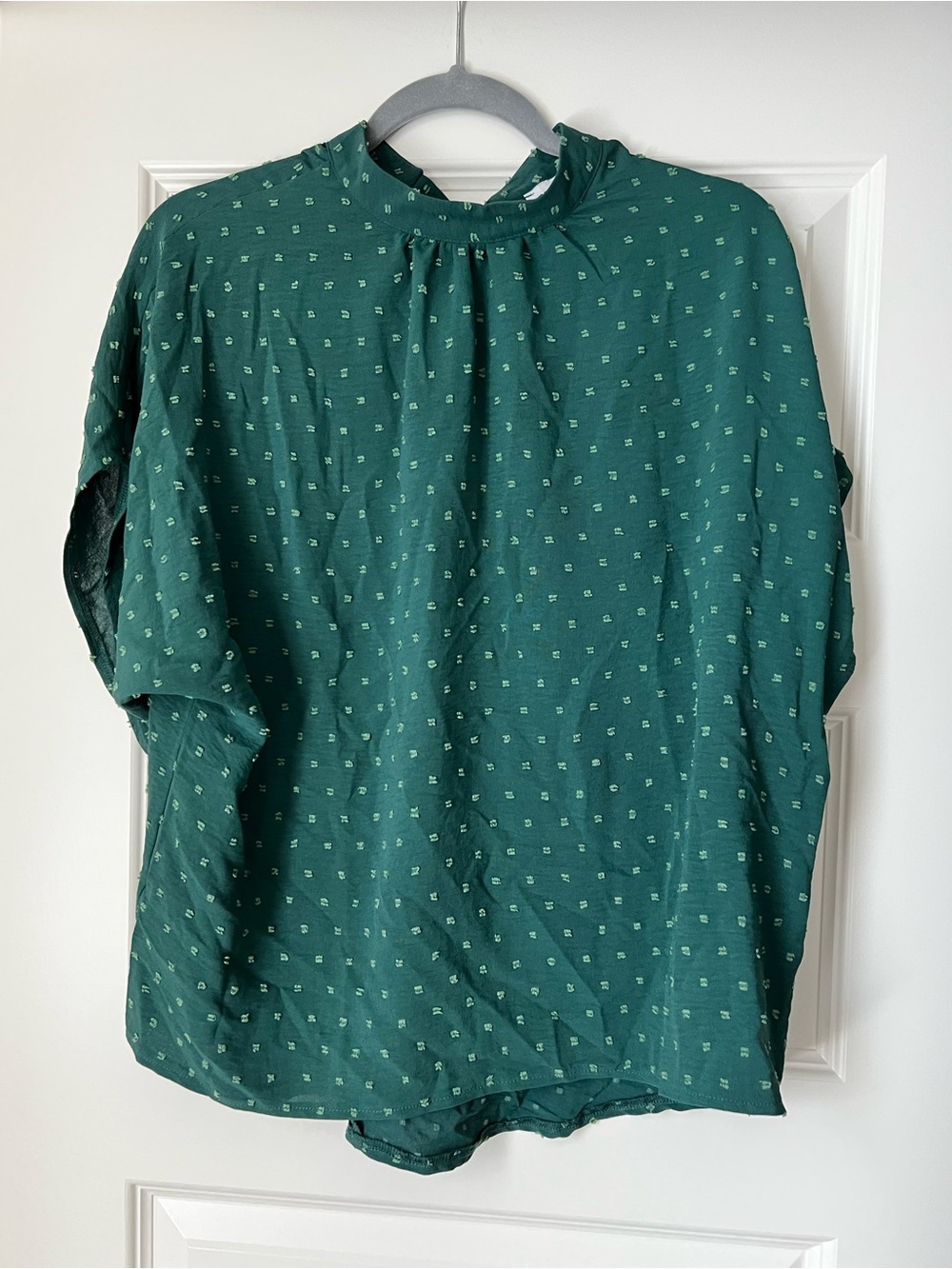 Elings green high-neck cap-sleeve blouse with a textured geometric micro-pattern